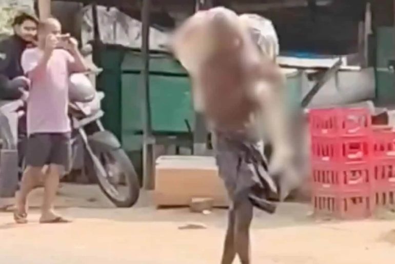 mezardan-cikardigi-cesedi-tasiyan